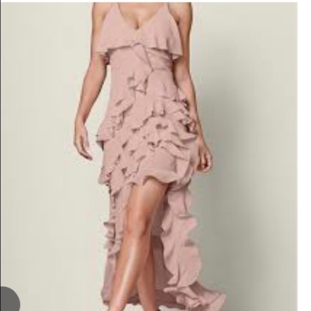 Beautiful dress, never worn. High low hem. Perfect for date night.